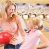 Learning How to Bowl, Mother and Daughter at Bowling Alley