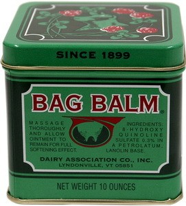 A green box of Bag Balm medicated ointment.