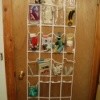 An over the door organizer filled with craft supplies.
