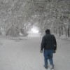 Man walking in the snow.