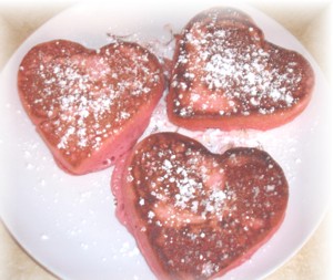 Pink heart shaped pancakes.