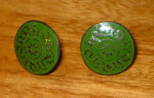 Two vintage buttons.