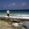 Christiansted (St.Croix, US Virgin Islands), man on ocean beach.