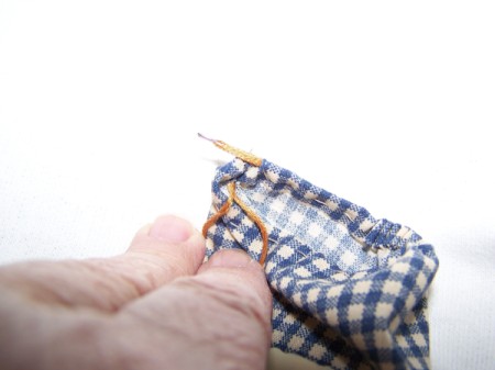 Threading A Drawstring using a needle.