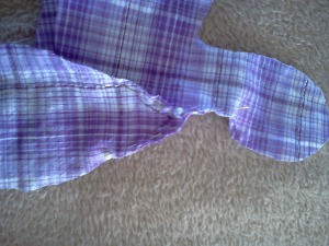 Pinning body pieces together.