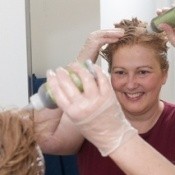 A woman dying her hair