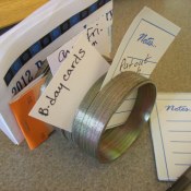 Reuse Slinky As Note Holder on your desk.