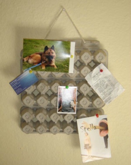 A bulletin board made from an egg carton.