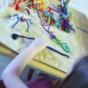 Pipe Cleaner Play Case - Down view of pipe cleaner art work in process.