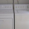 A white washer and dryer.