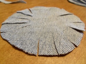 Circle with slits cut into it.