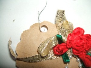 Attaching wire hanger through hole.