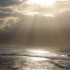 Scenery: Ocean (Maui, Hawaii) - waves with the sun shining through the clouds.