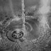 Water in a stainless steel sink.