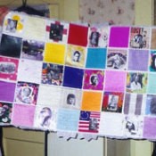 A quilt made of pictures of different famous women.