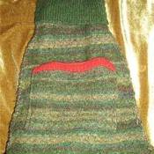 A purse made from a shrunken sweater.