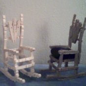 A rocking chair made from clothespins, for a doll or dollhouse.