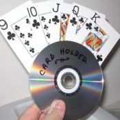 A holder for a hand of cards from a recycled CD