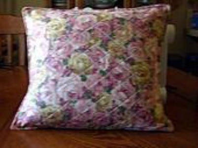 A flowered throw pillow cover.