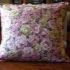 A flowered throw pillow cover.
