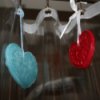 Recycled Candle Wax Air Freshener - Air fresheners hanging from shower curtain rings.