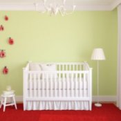 Baby nursery with a white crib.