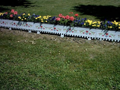 driveway planter with flowers