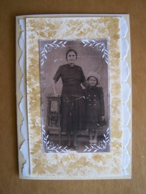 Photo glued to front of card.