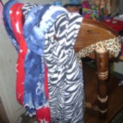 Storing Winter Scarves on a chair.