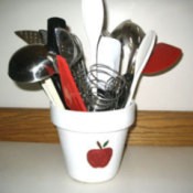 Apple Kitchen Utensil Holder - white painted flowerpot with red apple design