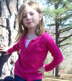 Be Your Own Photographer - A photo of a girl beside a tree.