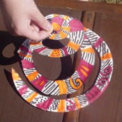 A spiral twirler for decoration, made from a paper plate.