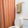 Striped shower curtain in bathroom