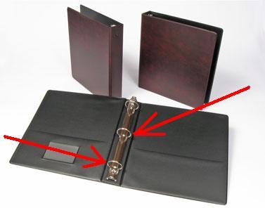 Three ring notebook binder.