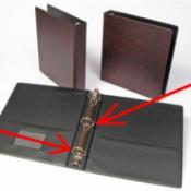 Three ring notebook binder.