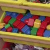toys organized in plastic bins