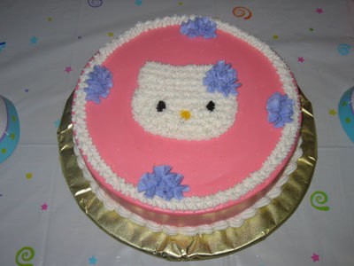 A cake decorated with Hello Kitty.