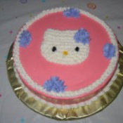 A cake decorated with Hello Kitty.