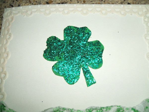 Shamrock glued to top of card.