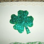 Shamrock glued to top of card.