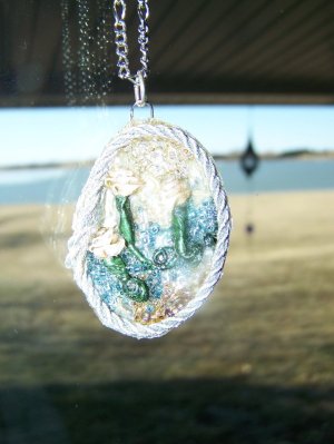 Suncatcher Pendant in a window.
