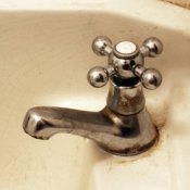 Removing rust stains from a sink.