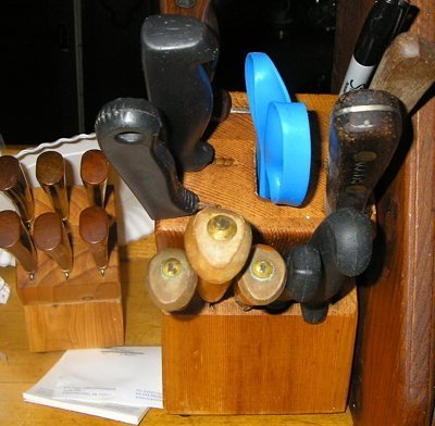 Kitchen knives in storage blocks.