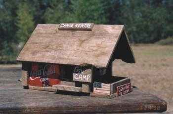 A bird house made form scavenged wood.