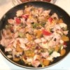 Large pan holding cooked "End of Month Stir Fry"