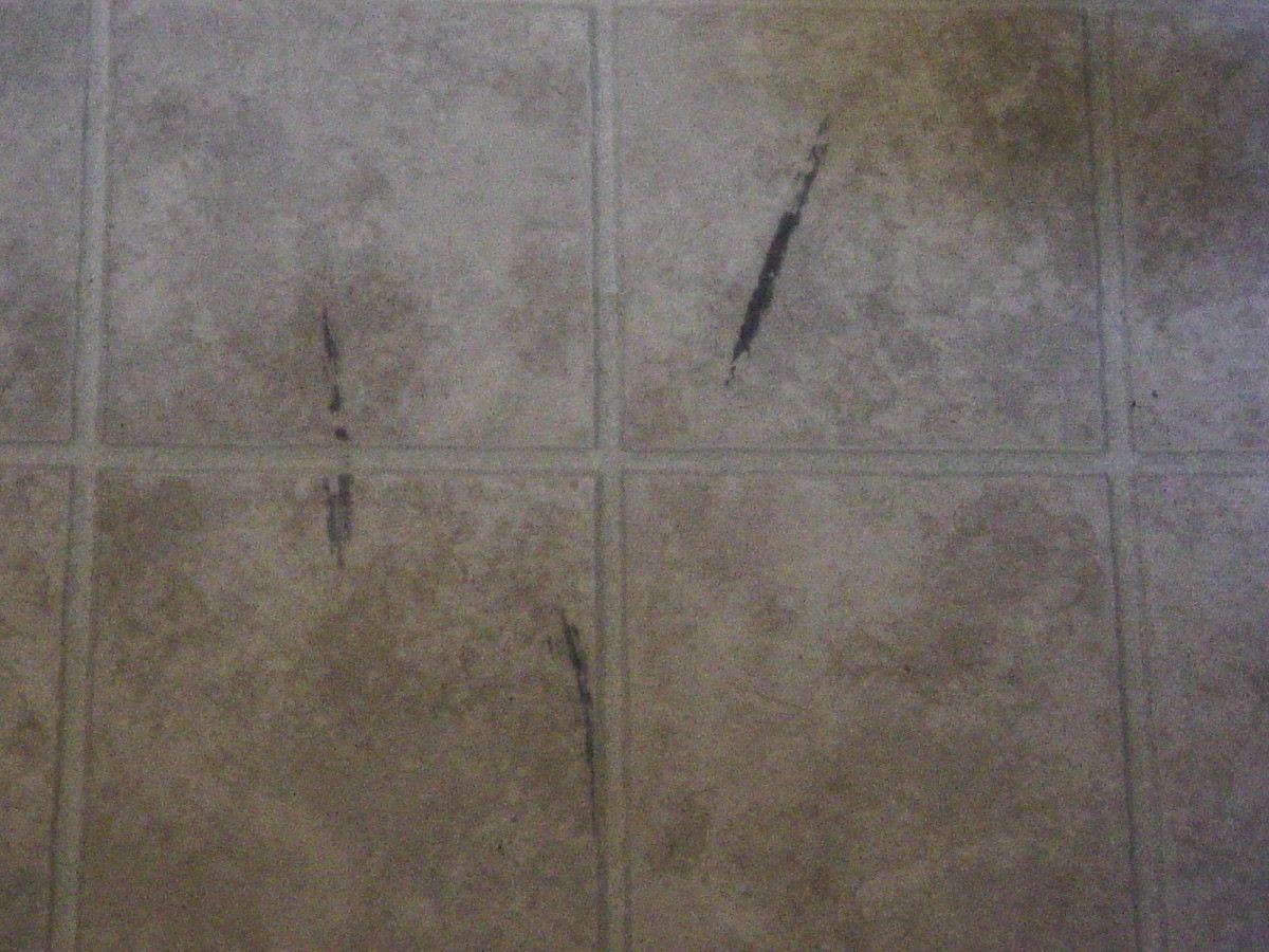 Removing Scuff Marks With Wd 40, How To Remove Black Scuff Marks From Laminate Flooring