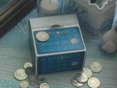 A piggy bank made from credit cards.