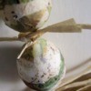 Decoupaged Easter eggs made from strips of paper.