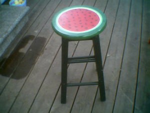 Cool stool painted to look like a watermelon.