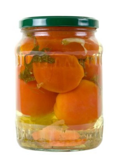 Jar of pickled tomatoes.